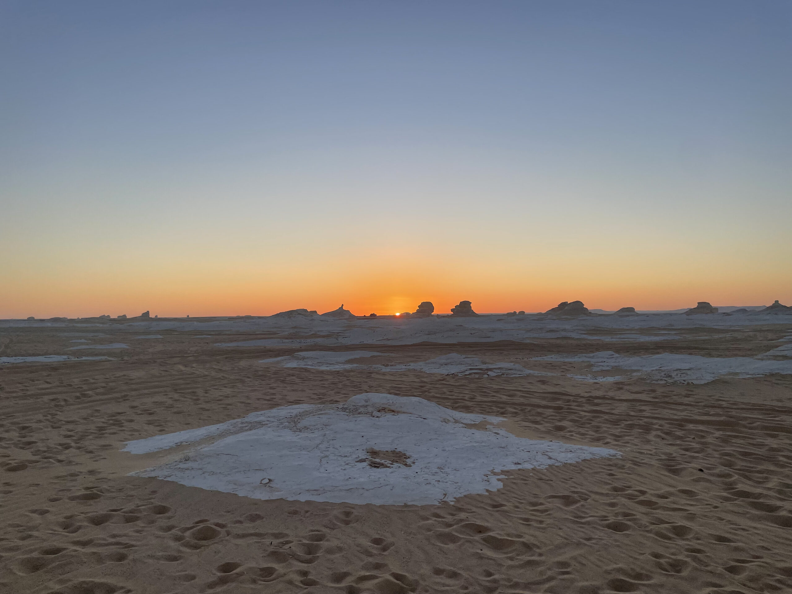 Sunset while camping In The White Desert In Egypt