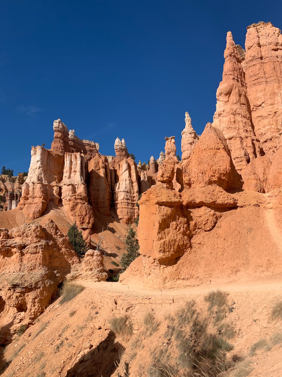 brown rock formations under blue sky