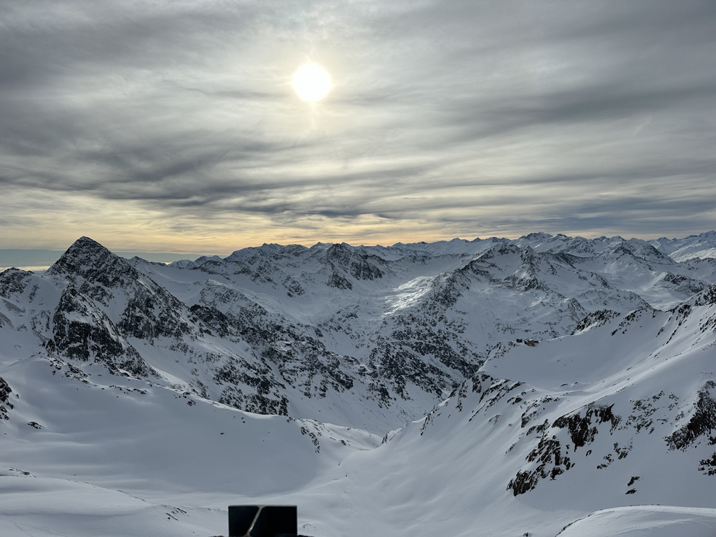 mountain peaks with sun sunset in Stubai Glacier