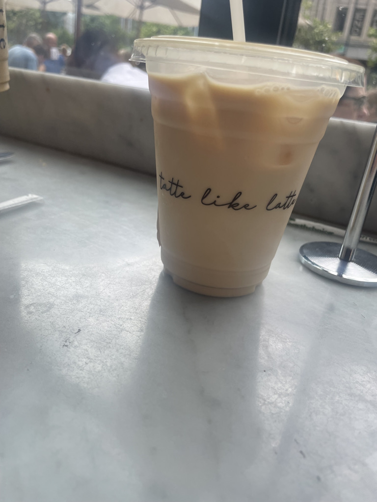 Coffee with words "tatte like latte" at Tatte Bakery & Café