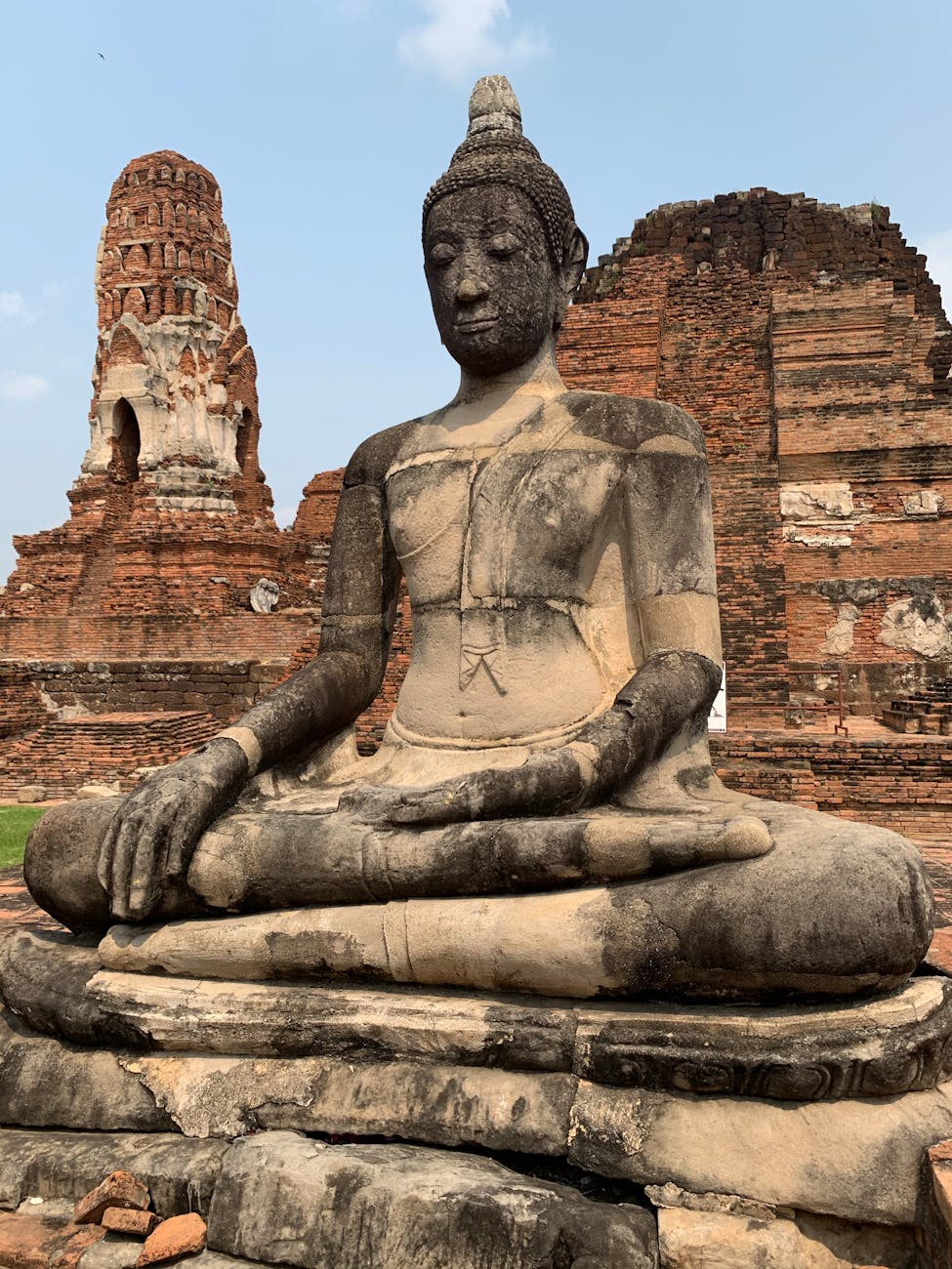 an ancient statue made of stone